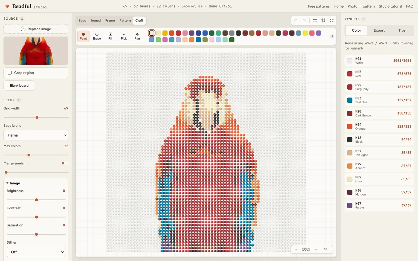 The Beadful Studio craft mode showing the scarlet macaw pattern with check-off tracking as you place beads