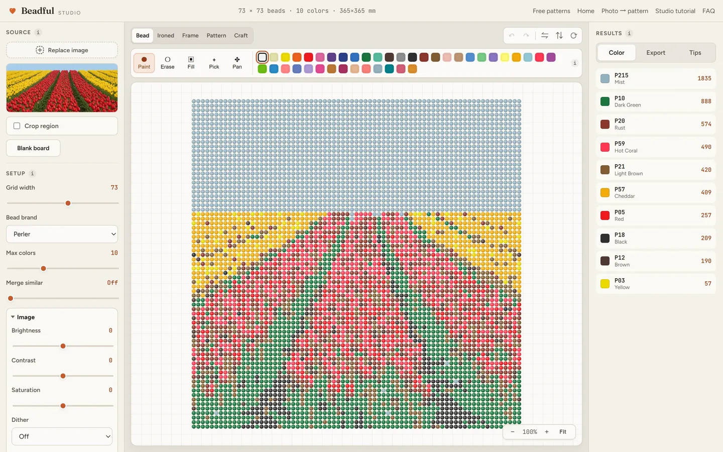 The Beadful Studio bead grid view showing the tulip field pattern at 73 by 73, with the source photo and color panel visible